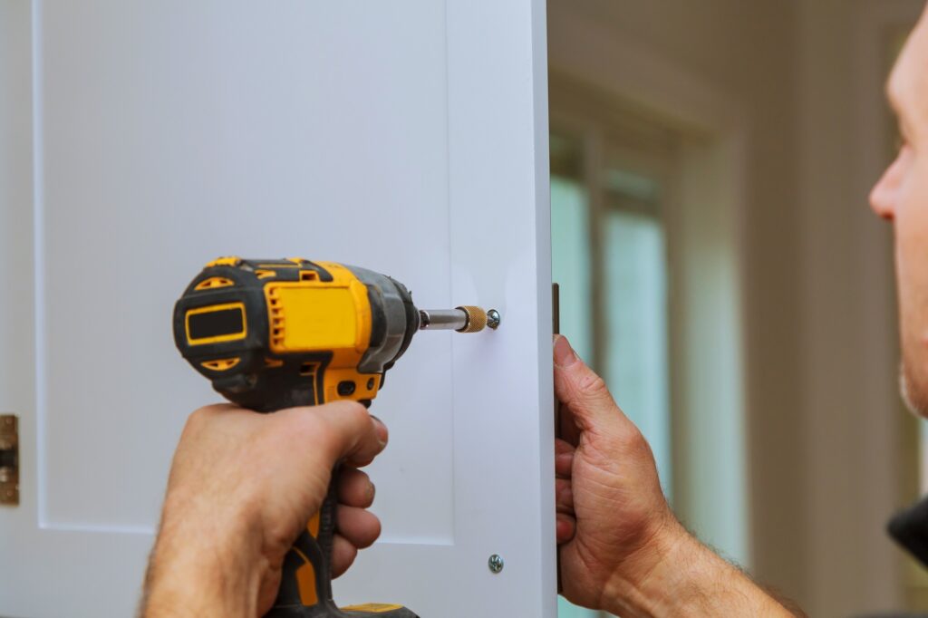 Handyman installation of door handles on kitchen cabinets Fixing Door In Kitchen
